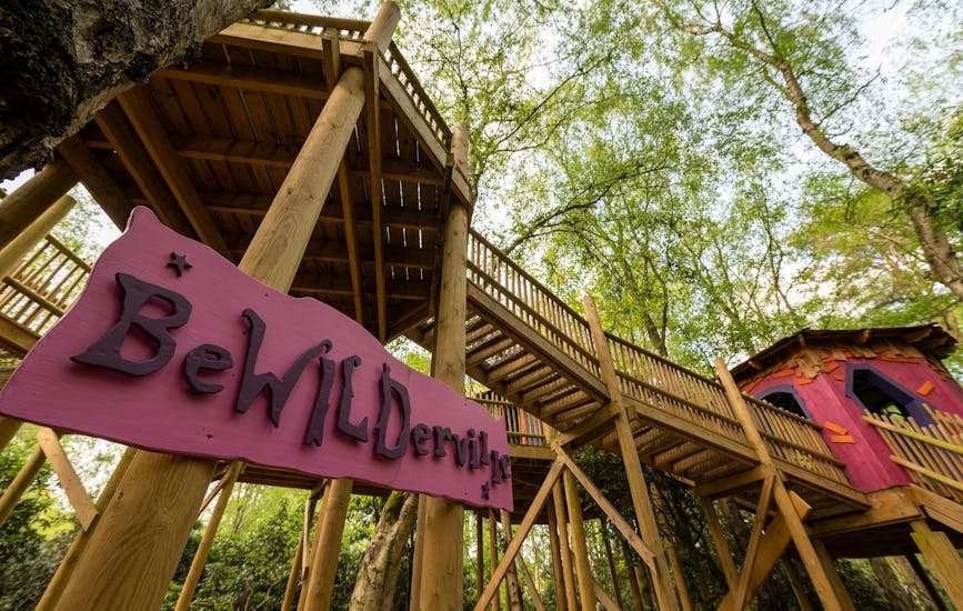 A large pink wooden structure in BeWILDerwood Cheshire