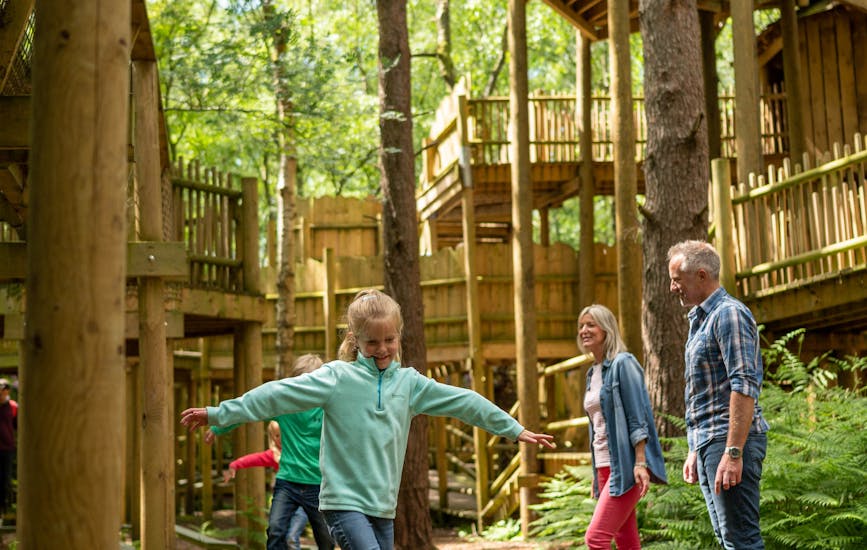 A family plan on the Sky Maze at BeWILDerwood Cheshire