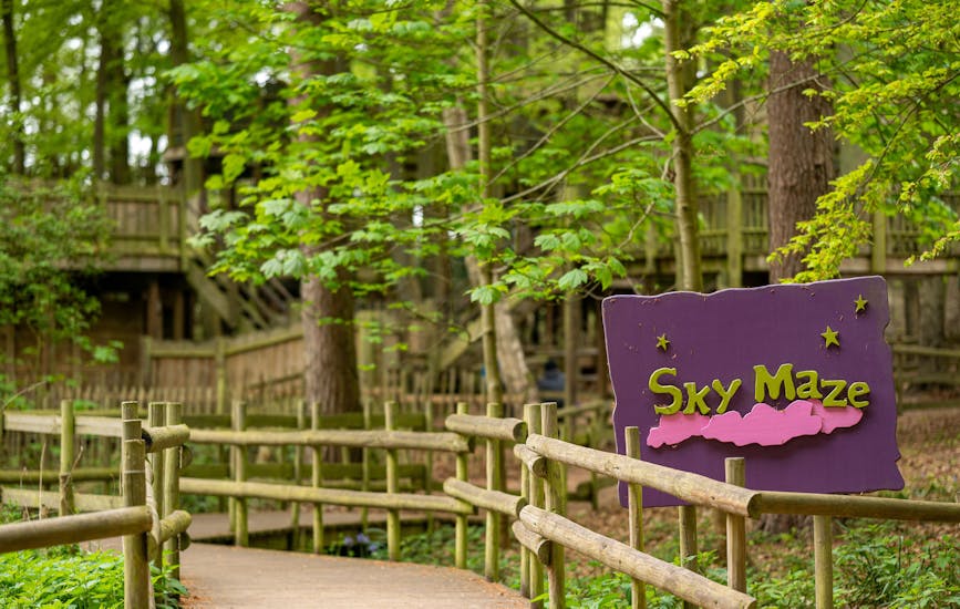 Wooden sign for the Sky Maze at BeWILDerwood Norfolk