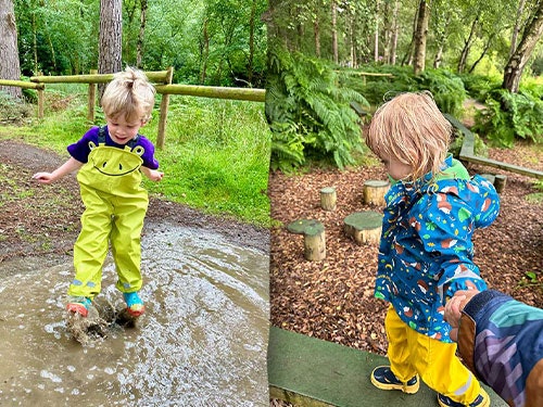 Children play in the rain at BeWILDerwood
